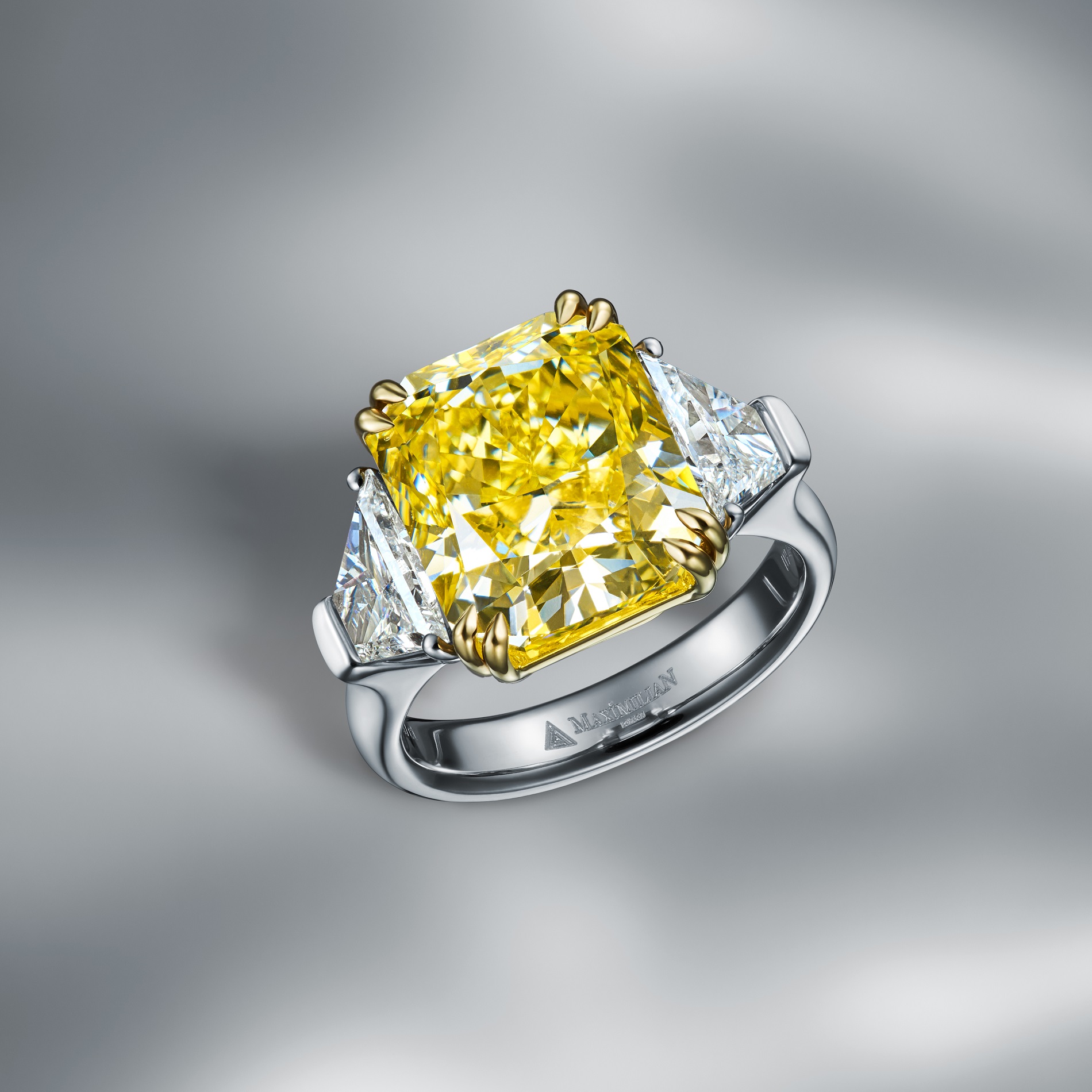 Extraordinary Diamond Ring Set With A Radiant Cut Fancy Intense Yellow Diamond Internally Flaweless